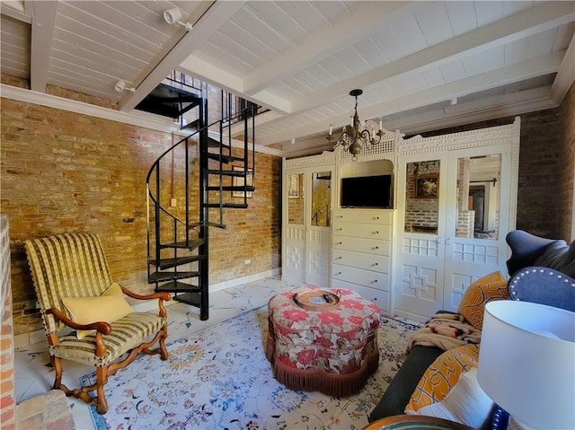 living area with beam ceiling, brick wall, and an inviting chandelier