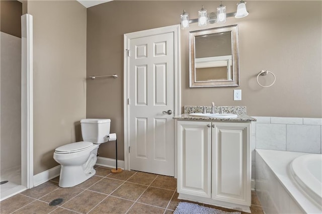 full bathroom with plus walk in shower, tile patterned floors, vanity, and toilet