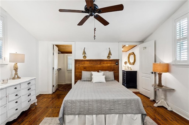 bedroom featuring lofted ceiling, ceiling fan, and dark wood-type flooring