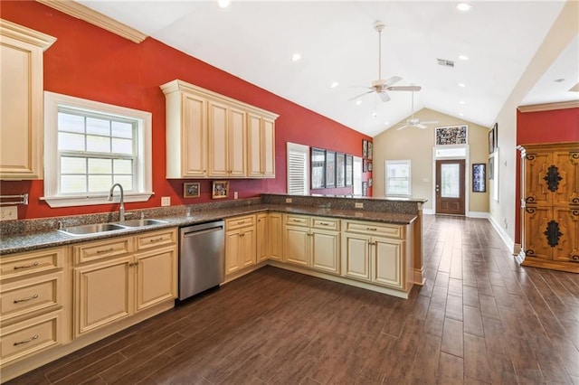 kitchen featuring kitchen peninsula, sink, dishwasher, vaulted ceiling, and dark hardwood / wood-style flooring