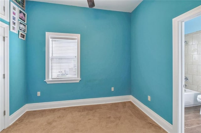 spare room with light carpet