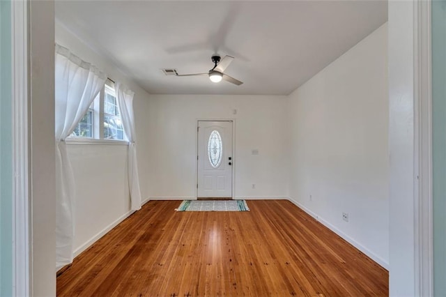 foyer featuring ceiling fan and hardwood / wood-style floors