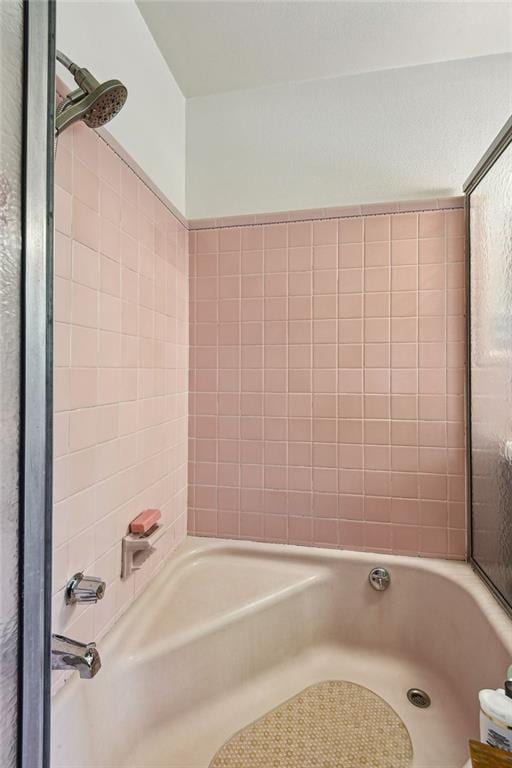 bathroom featuring plus walk in shower