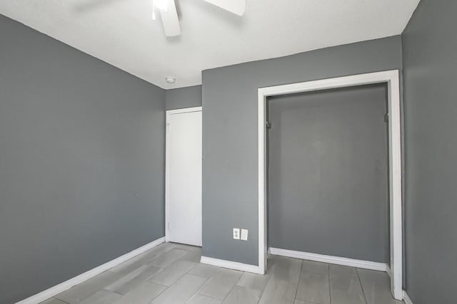 unfurnished bedroom with ceiling fan