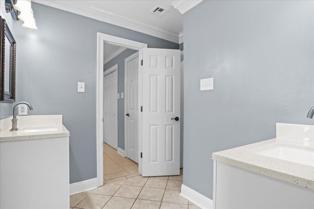 bathroom featuring vanity, crown molding, and tile patterned flooring