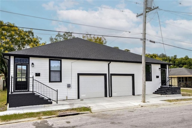 single story home featuring a garage