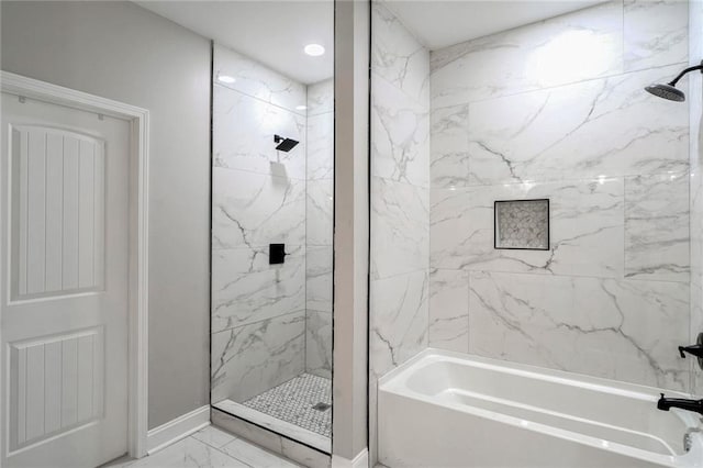 bathroom with tiled shower / bath