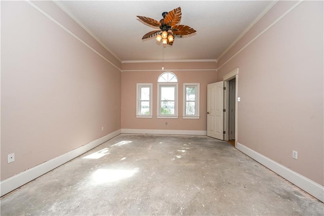 empty room with ceiling fan and crown molding