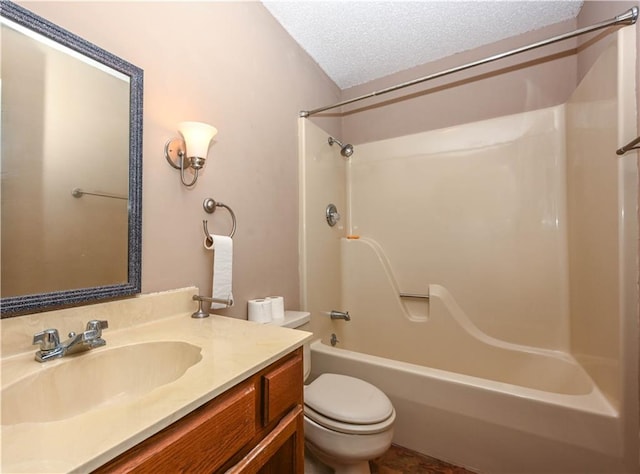 full bathroom with vanity, a textured ceiling, toilet, and tub / shower combination