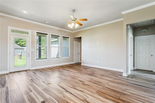 empty room featuring crown molding, light wood-type flooring, and ceiling fan