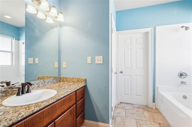 bathroom featuring vanity and a bathing tub