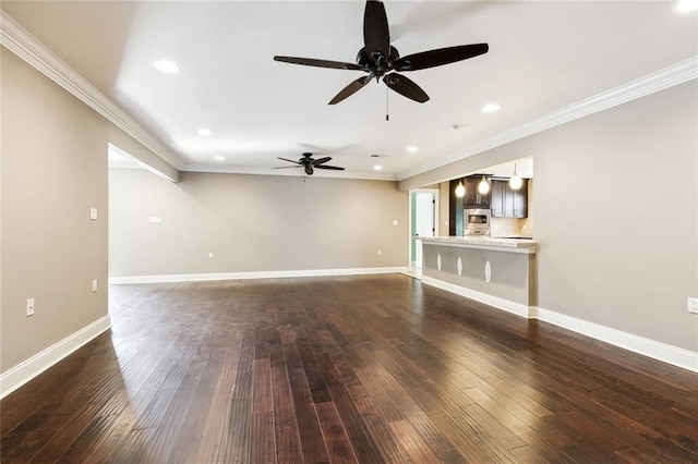 unfurnished living room with crown molding and dark hardwood / wood-style floors