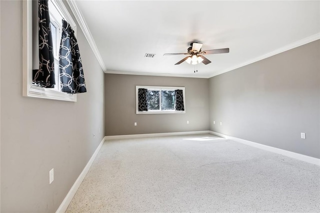 unfurnished room featuring ceiling fan and ornamental molding