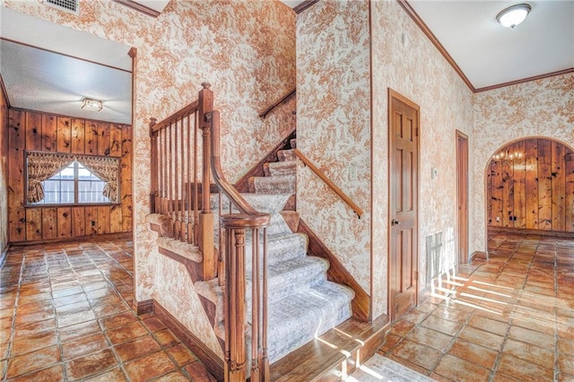 staircase with ornamental molding