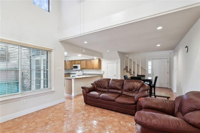 tiled living room with a wealth of natural light