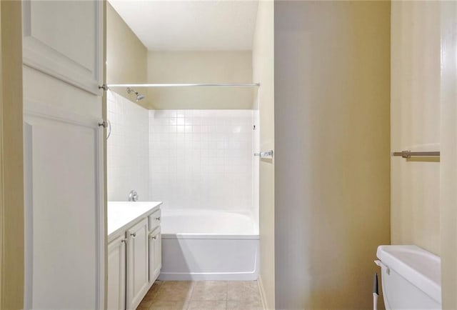 full bathroom featuring shower / tub combination, vanity, tile patterned flooring, and toilet