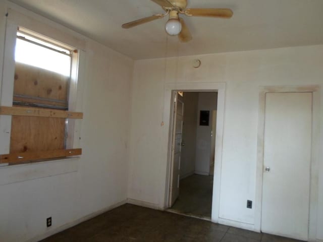 spare room featuring ceiling fan