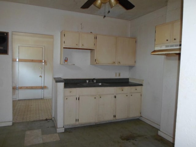 kitchen with ceiling fan and sink