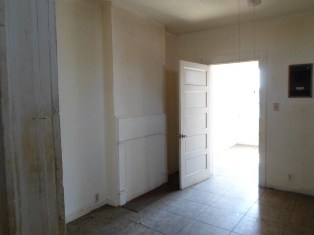 spare room with light tile patterned floors