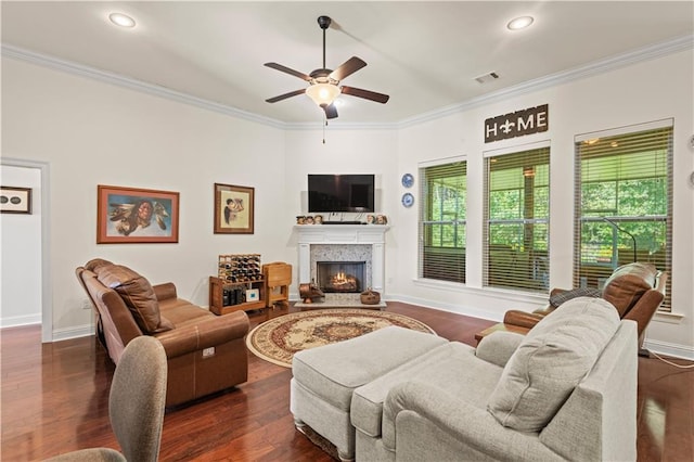 living room with ceiling fan, dark hardwood / wood-style floors, and crown molding