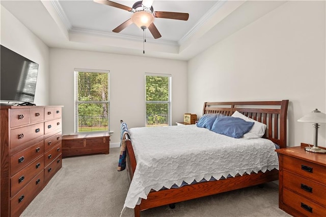 640 Pine Grove Loop, Madisonville, LA 70447 - bedroom featuring light carpet, ornamental molding, a raised ceiling, and a ceiling fan