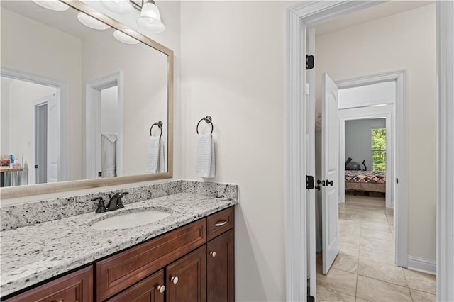 640 Pine Grove Loop, Madisonville, LA 70447 - bathroom featuring vanity, ensuite bathroom, and marble finish floors