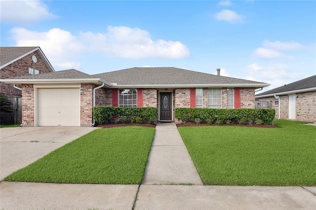 ranch-style home featuring a garage and a front yard