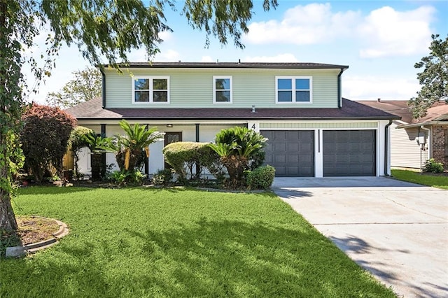 front of property featuring a garage and a front lawn