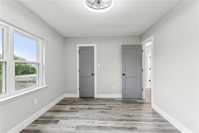 unfurnished bedroom with light hardwood / wood-style flooring