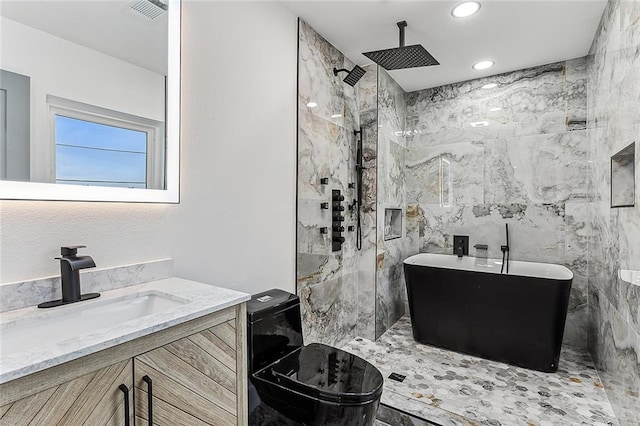 bathroom featuring separate shower and tub and vanity