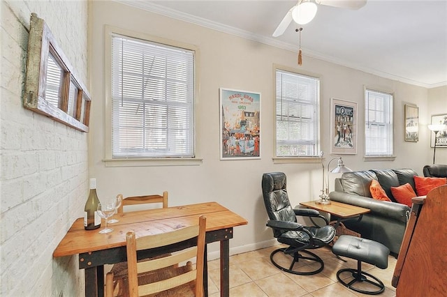 interior space with ceiling fan and ornamental molding