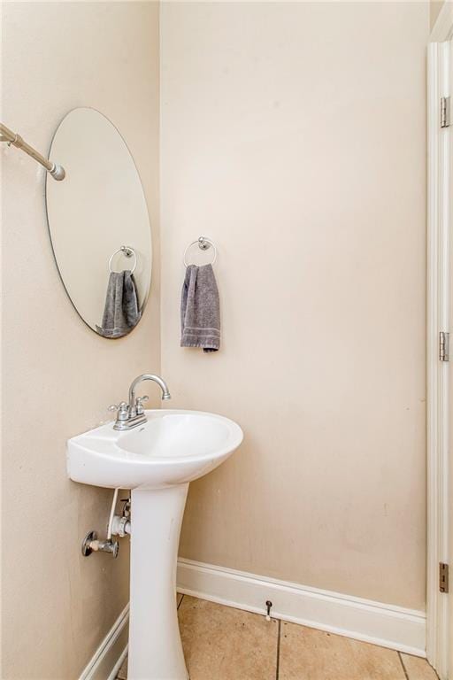 bathroom featuring tile patterned floors and sink