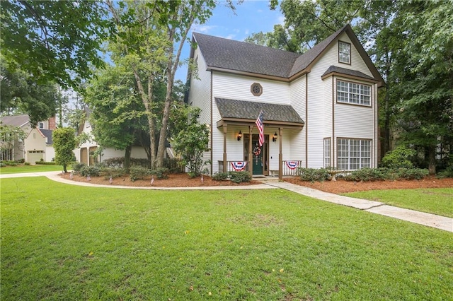 view of front of property with a front lawn