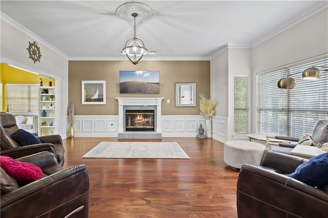 living room with crown molding and dark hardwood / wood-style flooring