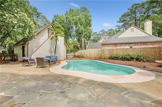 view of swimming pool featuring outdoor lounge area and a patio area