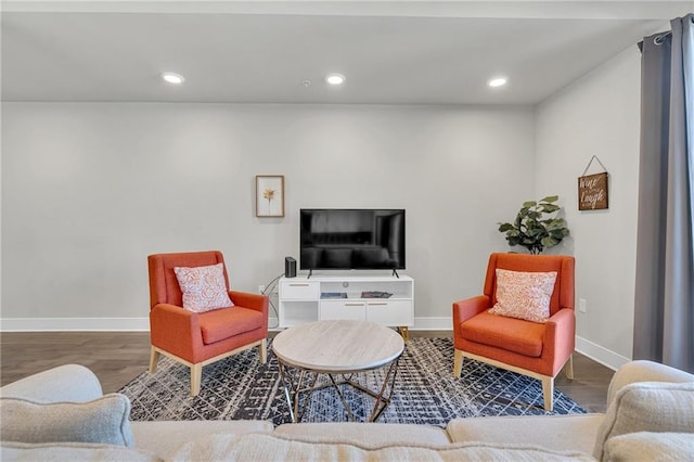 living room with dark hardwood / wood-style floors