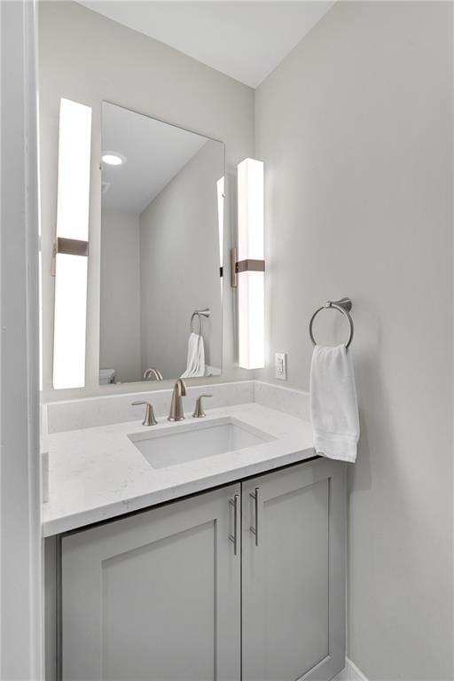 bathroom with a wealth of natural light and vanity