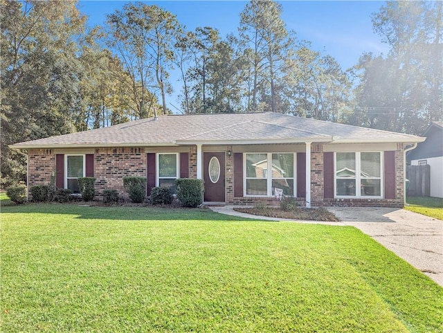 ranch-style house with a front lawn