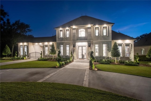 view of front of property with a yard