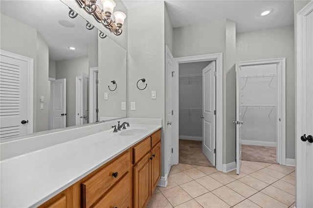 bathroom with vanity and tile patterned flooring