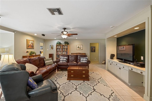 living room featuring ceiling fan and light tile patterned floors