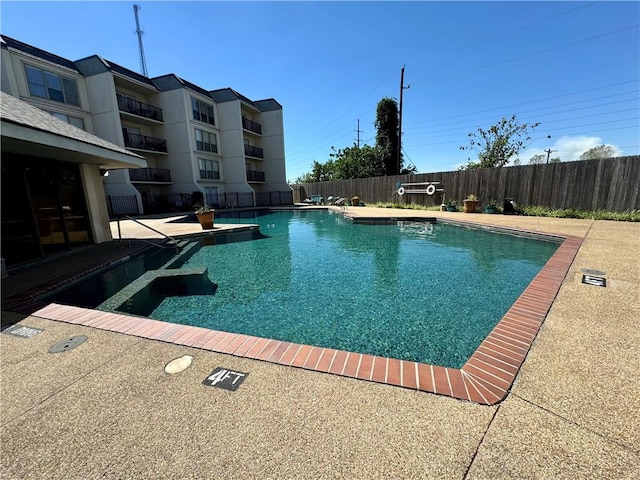 view of pool featuring a patio