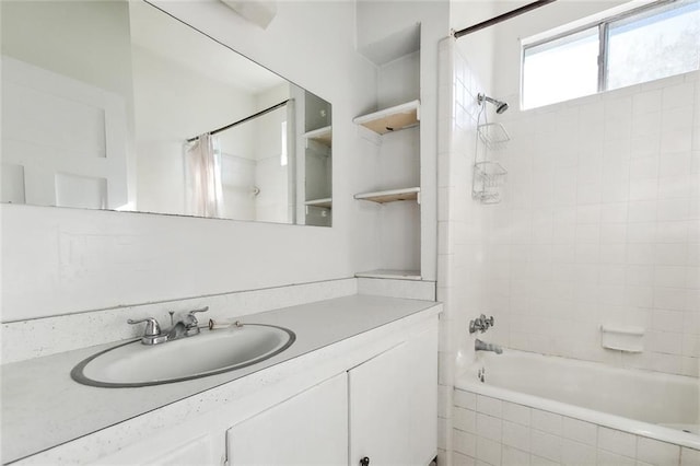 bathroom with vanity and shower / bath combo with shower curtain