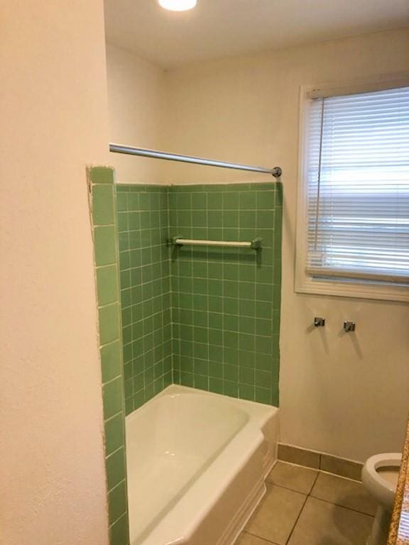 bathroom with independent shower and bath, tile patterned flooring, and toilet