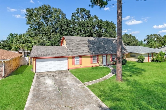 ranch-style home with a front yard and a garage