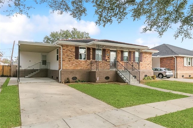 ranch-style house with a carport and a front lawn