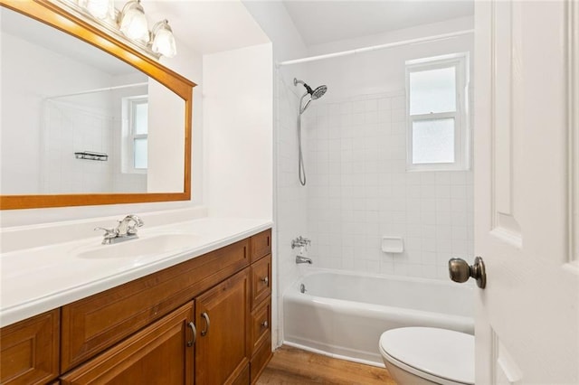 2109 Airline Park Blvd, Metairie, LA 70003 - full bath with toilet, vanity, shower / bathtub combination, and wood finished floors
