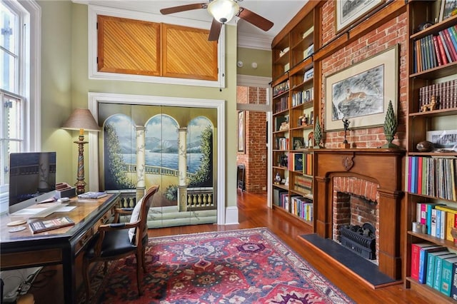 office with ceiling fan, crown molding, a wealth of natural light, and wood-type flooring