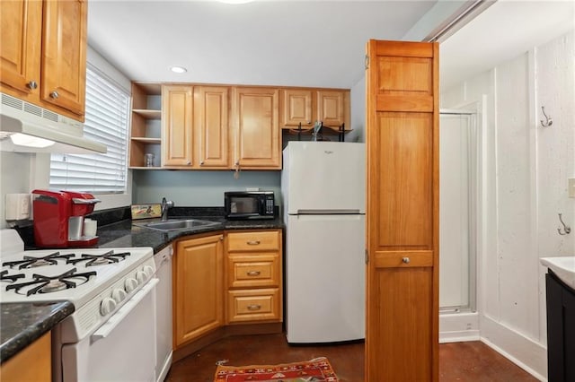 kitchen featuring sink and white appliances