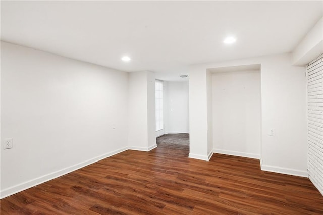 interior space with dark hardwood / wood-style flooring